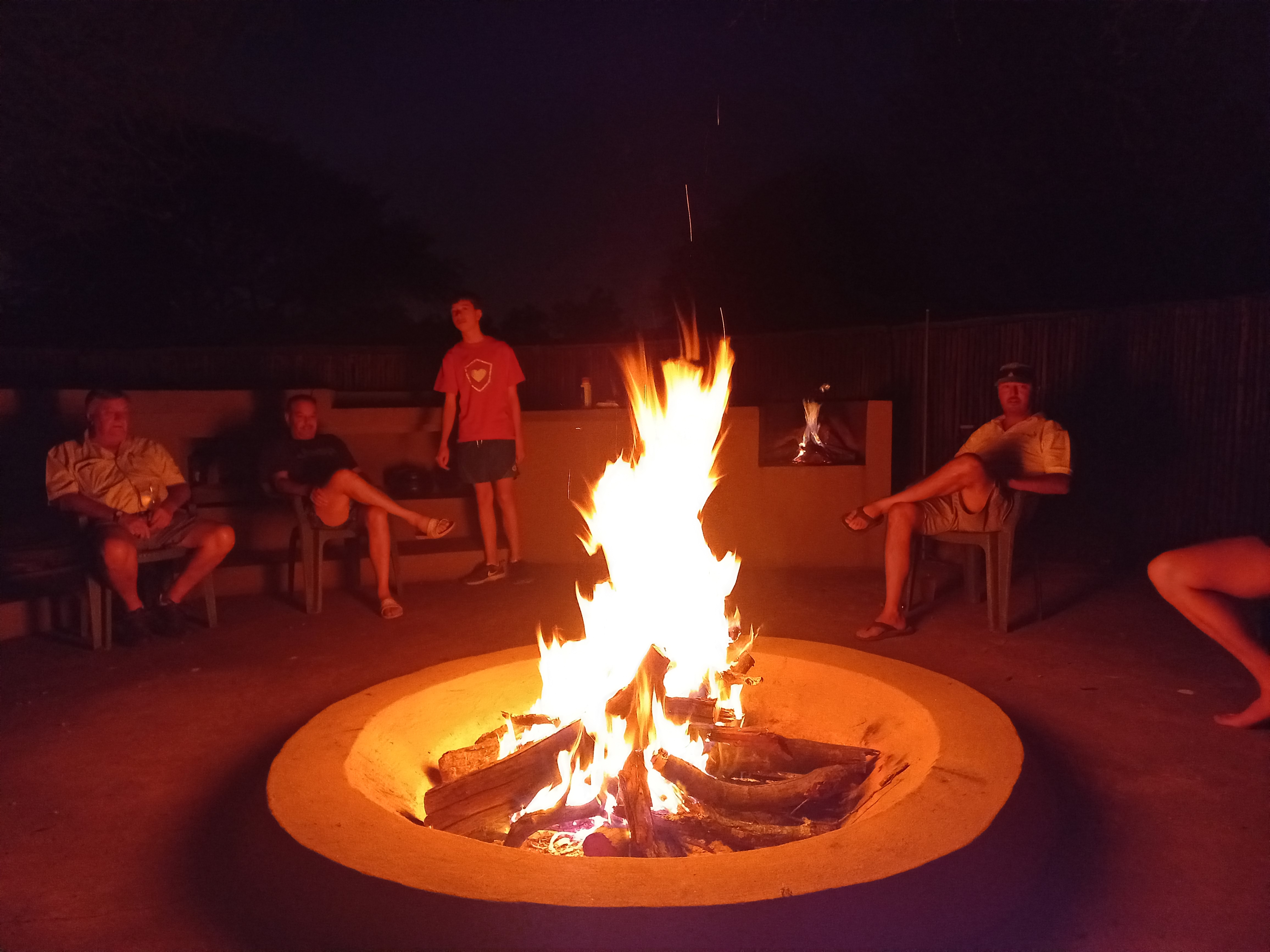 boma fire Evening bonfire in private boma at Sun Acres Farm, Dinokeng, under a starry African sky
